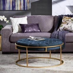Gold Finish Blue Velvet Button Tufted Round Ottoman by HomeSullivan